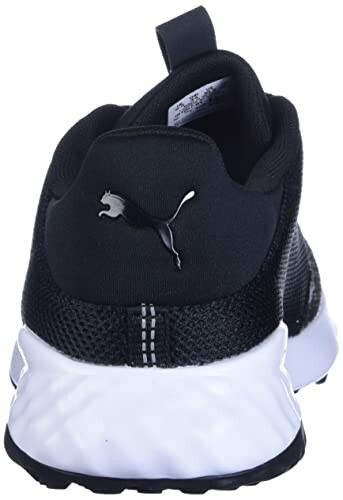 Back view of a black sneaker with a white sole and a logo.