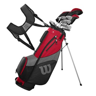 Wilson golf club set with red and black bag and stand.